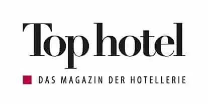 ALT-Text: Logo von Top hotel, einem Fachmagazin für die Hotellerie, mit prägnanter Typografie und rotem Quadrat.