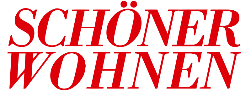ALT-Text: Rotes Logo mit dem Schriftzug „SCHÖNER WOHNEN“ in versalhaften Buchstaben auf weißem Hintergrund.