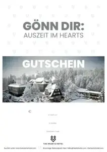 ALT-Text: Gutschein für das Hearts Hotel, mit winterlicher Landschaft und verschneiten Bäumen im Hintergrund.